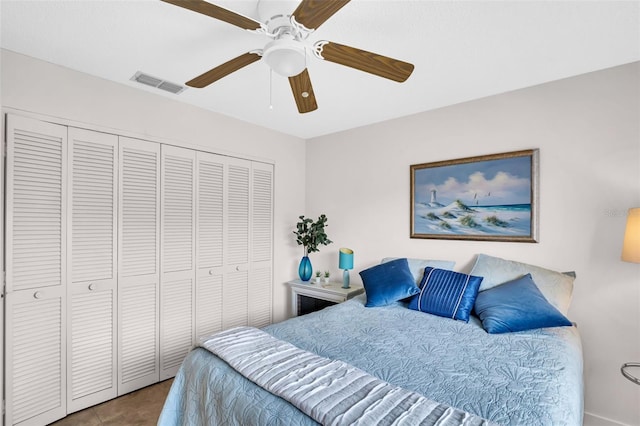 2506 Laurelwood Dr Unit 4C, Clearwater, FL 33763 - bedroom featuring a ceiling fan, tile patterned floors, visible vents, and a closet