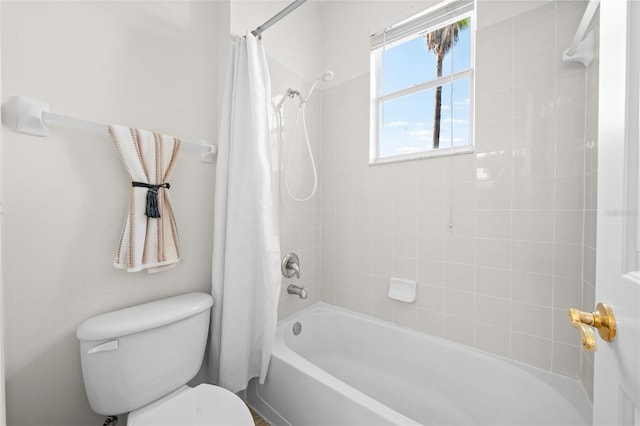 full bath featuring shower / tub combo with curtain and toilet