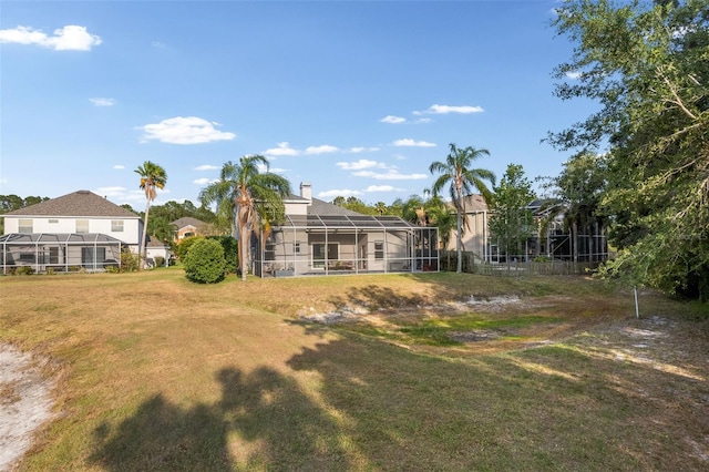 view of yard with a lanai