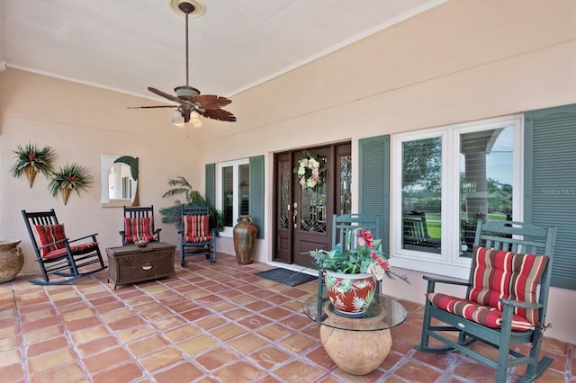 view of patio / terrace featuring ceiling fan and french doors