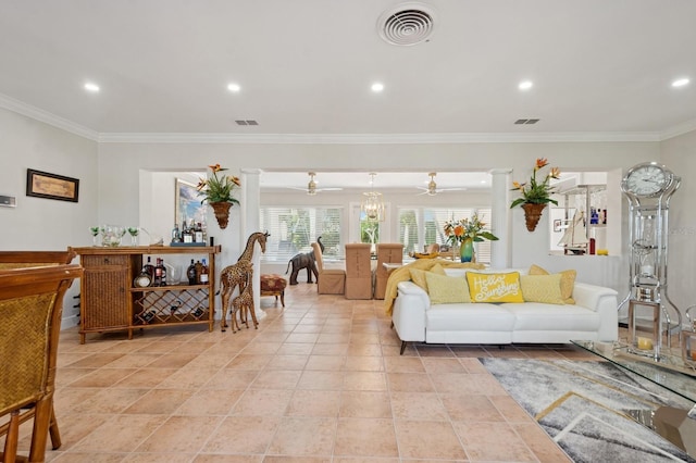 living area with visible vents, crown molding, and recessed lighting