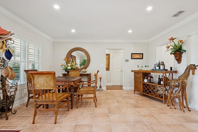 dining area featuring light tile patterned floors, crown molding, visible vents, baseboards, and recessed lighting
