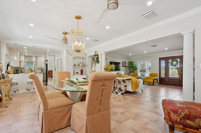 dining room with ornamental molding, recessed lighting, visible vents, and ornate columns