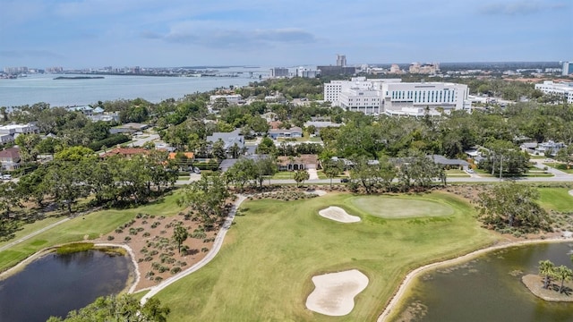 aerial view with a city view, a water view, and view of golf course