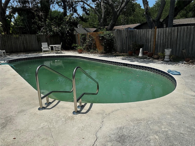 2154 Briarway Dr, Clearwater, FL 33763 - view of pool featuring a patio and a fenced backyard