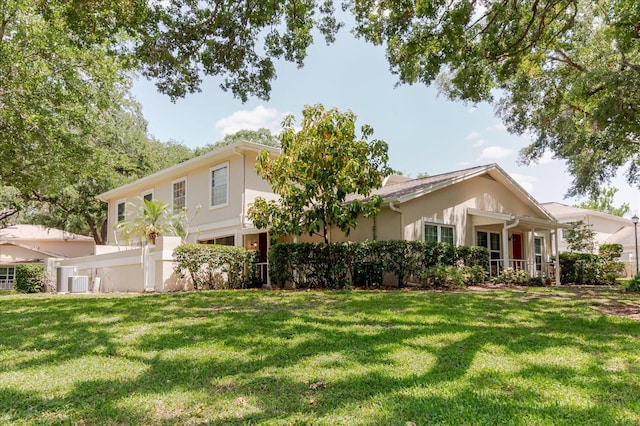 11802 Foxrun Ln, Temple Terrace, FL 33617 - view of front of house featuring a front lawn and stucco siding