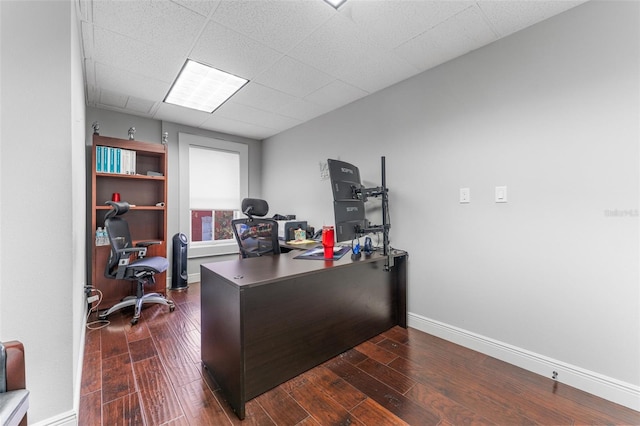 office space featuring baseboards and dark wood finished floors