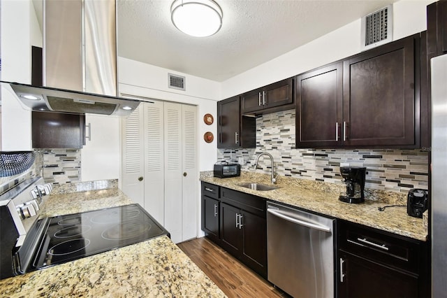1235 S Highland Ave Unit 2-207, Clearwater, FL 33756 - kitchen featuring dishwasher, island exhaust hood, black electric range oven, dark wood-type flooring, and decorative backsplash