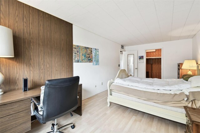 1235 S Highland Ave Unit 2-207, Clearwater, FL 33756 - bedroom with an office area and light wood-style floors