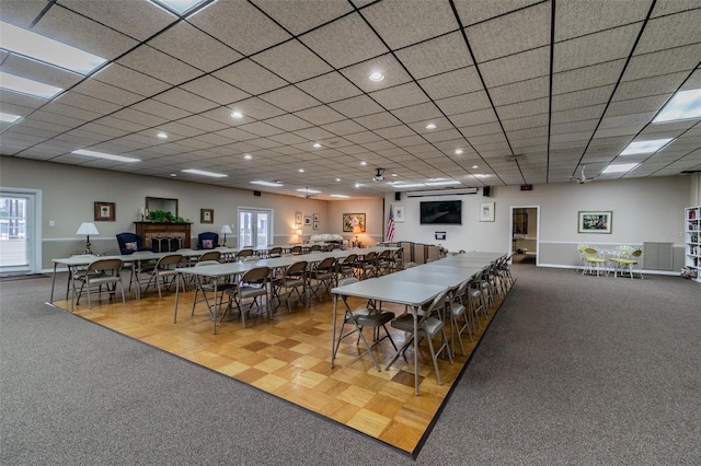 1235 S Highland Ave Unit 2-207, Clearwater, FL 33756 - carpeted dining room with a fireplace and baseboards