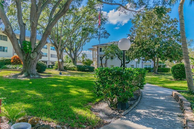 1235 S Highland Ave Unit 2-207, Clearwater, FL 33756 - view of property's community with a lawn