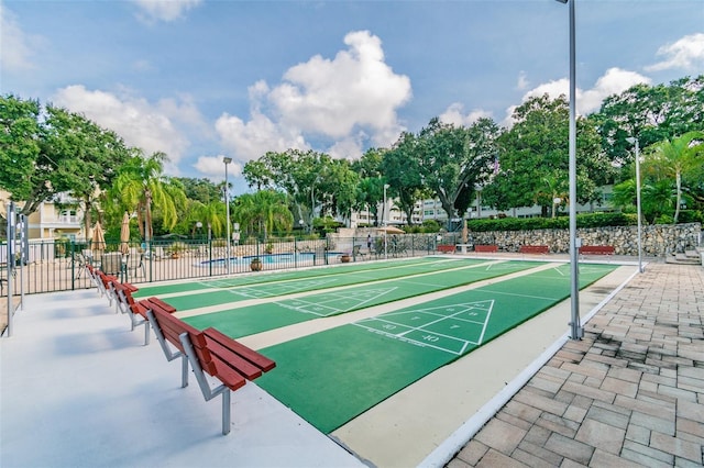 1235 S Highland Ave Unit 2-207, Clearwater, FL 33756 - surrounding community with fence and shuffleboard