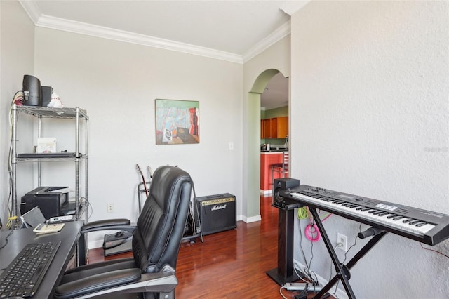 office with crown molding, arched walkways, baseboards, and dark wood-type flooring
