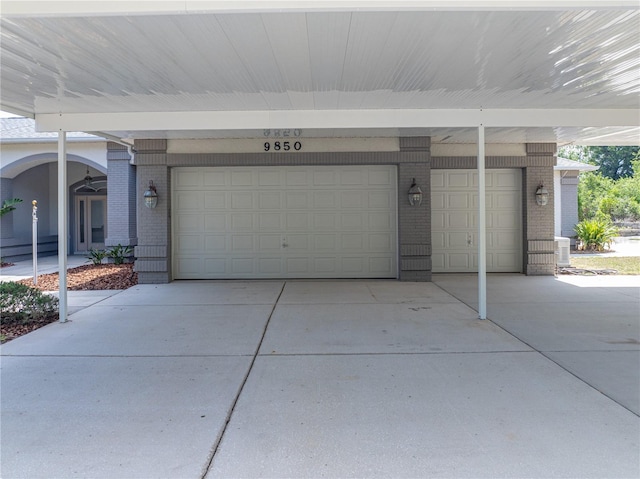 garage with driveway
