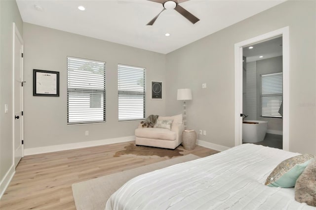 bedroom featuring ceiling fan, recessed lighting, light wood-style flooring, and baseboards