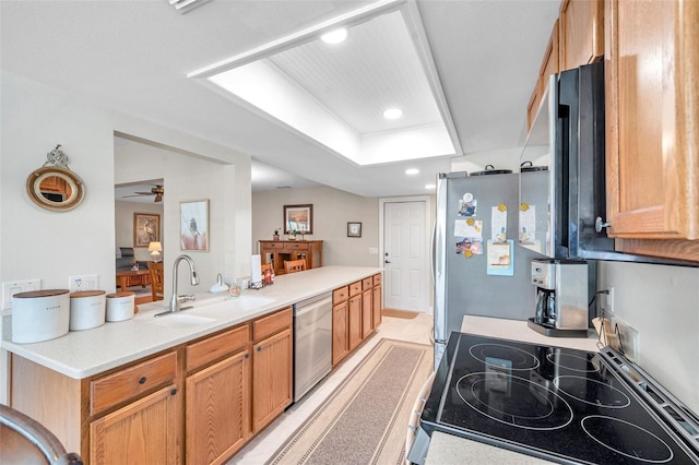 9335 Stonewall, New Port Richey, FL 34655 - kitchen with stainless steel appliances, a sink, recessed lighting, light countertops, and a ceiling fan