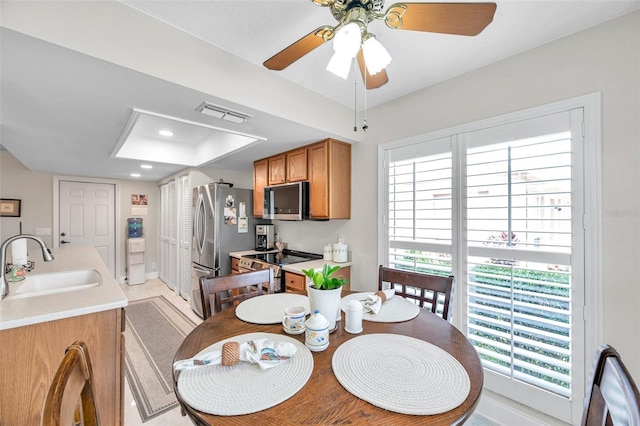 9335 Stonewall, New Port Richey, FL 34655 - dining space featuring ceiling fan, recessed lighting, and a raised ceiling