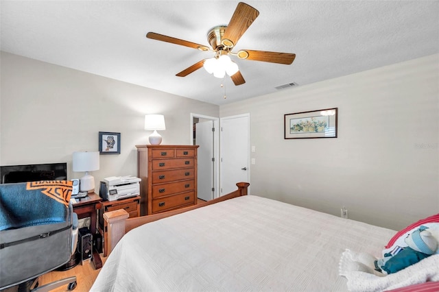 9335 Stonewall, New Port Richey, FL 34655 - bedroom featuring wood finished floors and ceiling fan