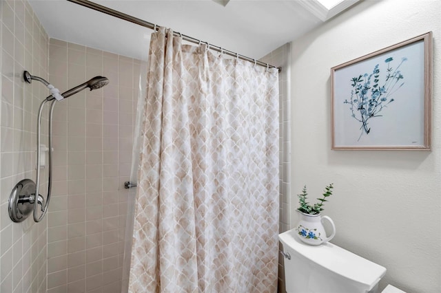 9335 Stonewall, New Port Richey, FL 34655 - bathroom featuring toilet and tiled shower