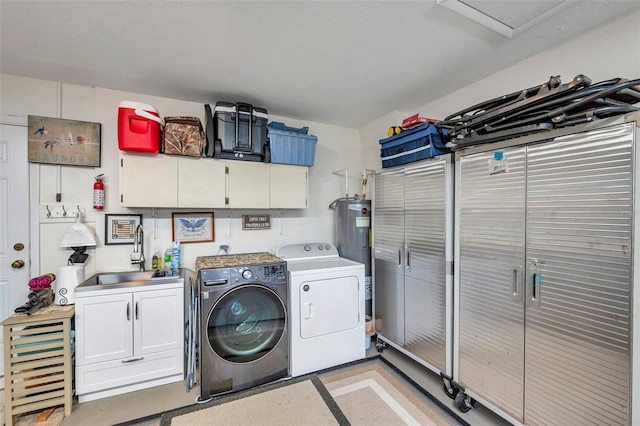 9335 Stonewall, New Port Richey, FL 34655 - laundry room featuring washer and dryer, cabinet space, and water heater
