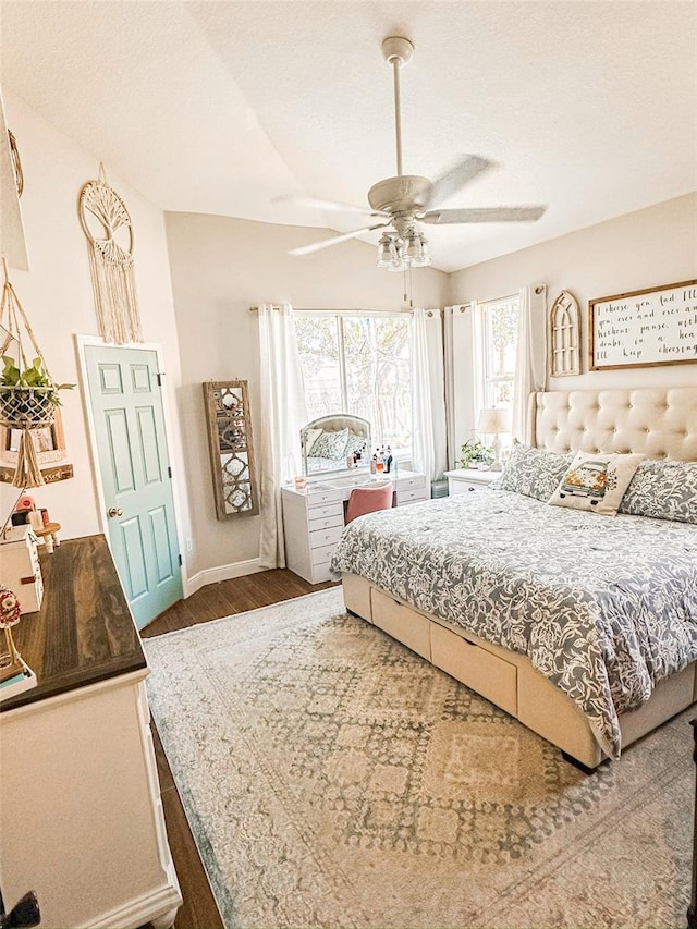 bedroom featuring ceiling fan and wood finished floors