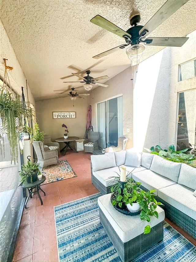 view of patio with ceiling fan and an outdoor hangout area