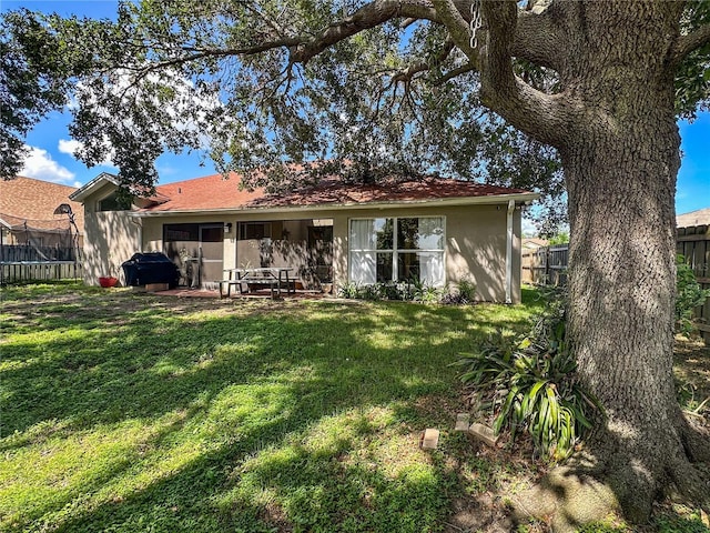 923 Tuscanny St, Brandon, FL 33511 - rear view of property featuring stucco siding