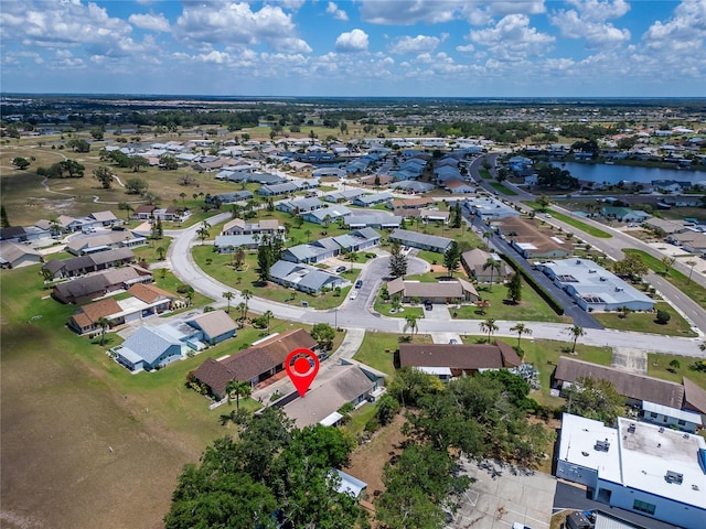 1349 New Bedford Dr Unit 6, Sun City Center, FL 33573 - aerial view of property and surrounding area with a large body of water and nearby suburban area