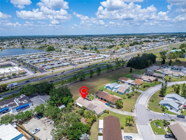 1349 New Bedford Dr Unit 6, Sun City Center, FL 33573 - aerial view of property and surrounding area with nearby suburban area and a nearby body of water