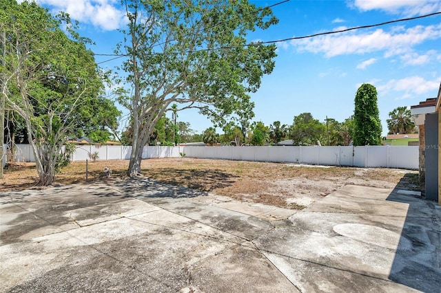 view of patio / terrace featuring fence