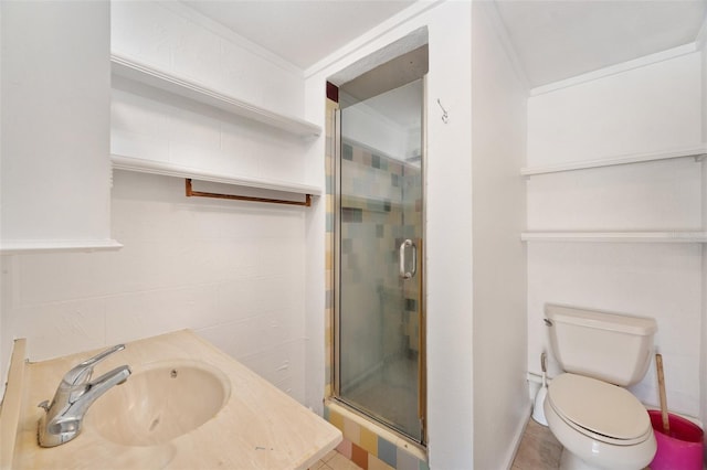 bathroom with a sink, toilet, and a shower stall