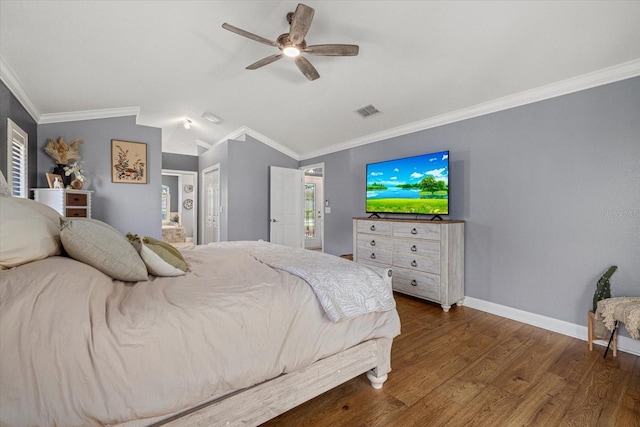 bedroom with visible vents, baseboards, crown molding, and wood finished floors