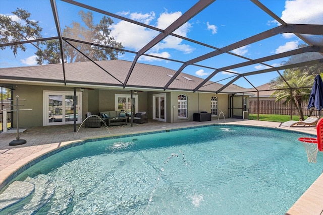 pool featuring fence, a patio, an outdoor living space, a ceiling fan, and a lanai