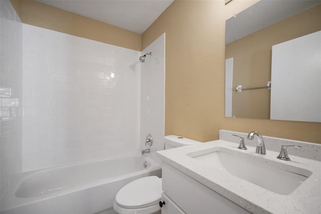 full bath featuring washtub / shower combination, vanity, and toilet