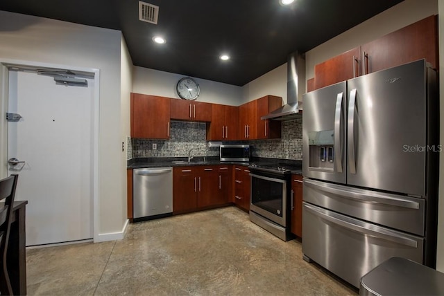 5008 S Macdill Ave Unit 10, Tampa, FL 33611 - kitchen with appliances with stainless steel finishes, dark countertops, finished concrete flooring, visible vents, and wall chimney exhaust hood