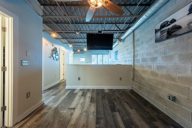 5008 S Macdill Ave Unit 10, Tampa, FL 33611 - below grade area featuring a ceiling fan, wood finished floors, and baseboards