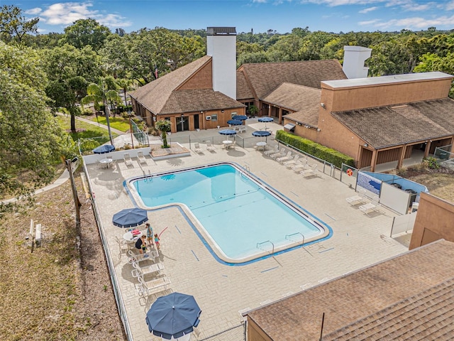 12601 Stone House Loop, Hudson, FL 34667 - pool with a patio and fence