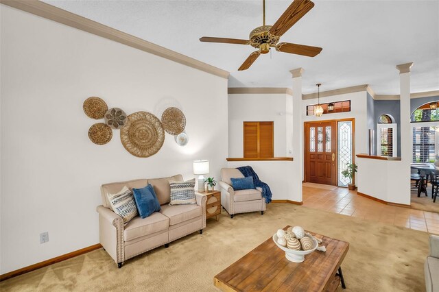 10 Greenhaven Cir, Oldsmar, FL 34677 - living room with baseboards, light colored carpet, ornamental molding, decorative columns, and a ceiling fan