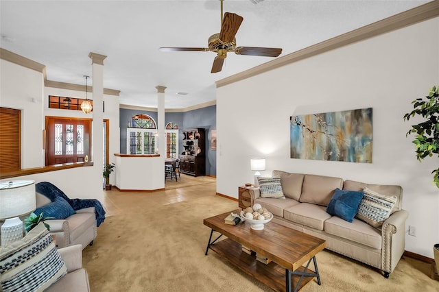 10 Greenhaven Cir, Oldsmar, FL 34677 - living room with decorative columns, ornamental molding, light colored carpet, baseboards, and a ceiling fan