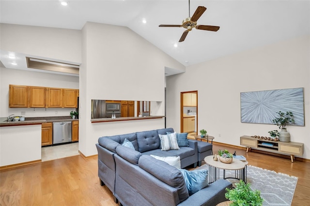 10 Greenhaven Cir, Oldsmar, FL 34677 - living area featuring high vaulted ceiling, light wood-type flooring, ceiling fan, baseboards, and recessed lighting