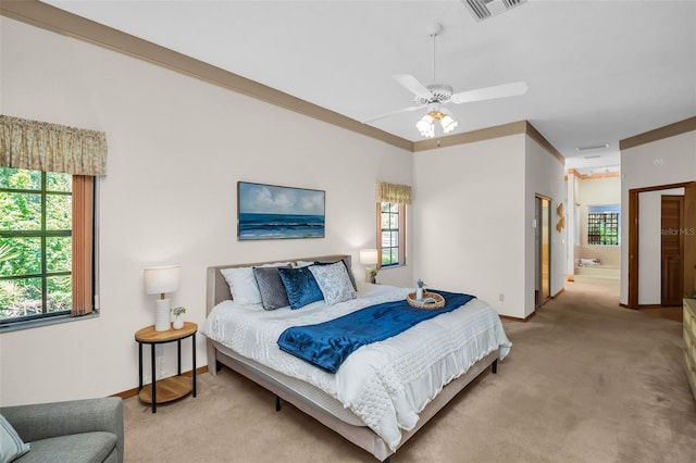 10 Greenhaven Cir, Oldsmar, FL 34677 - bedroom featuring light colored carpet, a ceiling fan, and ensuite bath