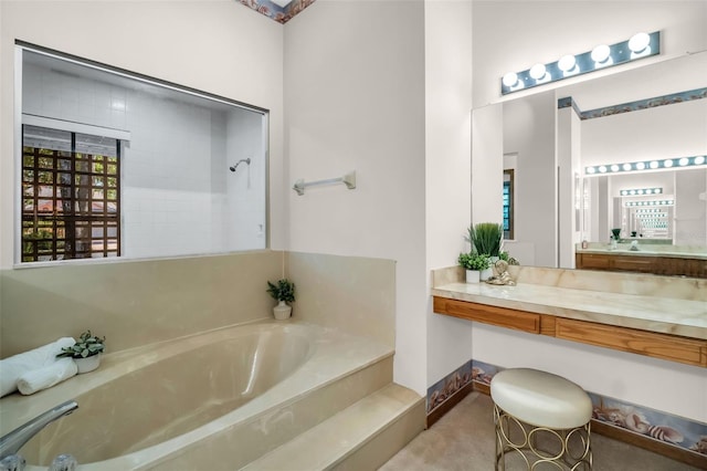 10 Greenhaven Cir, Oldsmar, FL 34677 - full bathroom featuring a garden tub, a shower, and vanity
