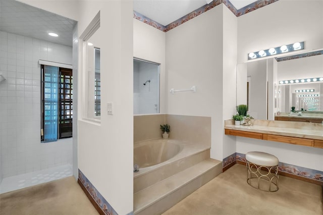 10 Greenhaven Cir, Oldsmar, FL 34677 - full bathroom featuring walk in shower, a bath, vanity, and baseboards