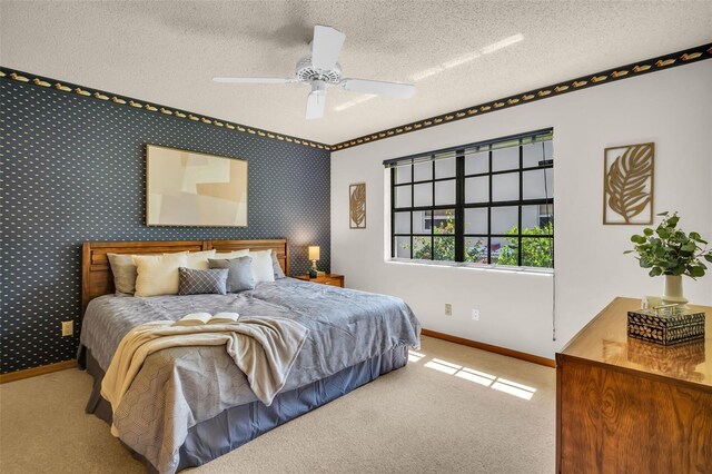10 Greenhaven Cir, Oldsmar, FL 34677 - carpeted bedroom featuring baseboards, a textured ceiling, and ceiling fan