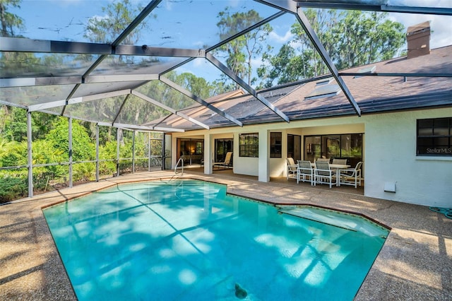 10 Greenhaven Cir, Oldsmar, FL 34677 - swimming pool with a patio area and glass enclosure