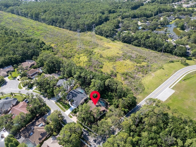 10 Greenhaven Cir, Oldsmar, FL 34677 - view of property location featuring a forest and nearby suburban area