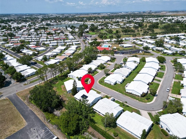 aerial view of property's location featuring nearby suburban area