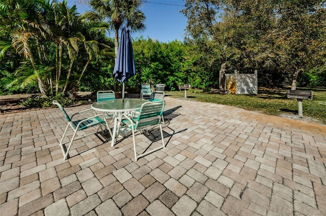 view of patio featuring outdoor dining space