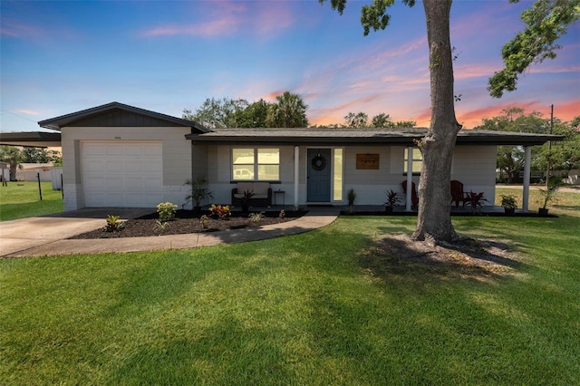 7494 7th St N, Saint Petersburg, FL 33702 - ranch-style home featuring a garage, a yard, and driveway
