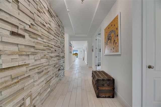 5814 Silver Sun Dr, Apollo Beach, FL 33572 - hallway featuring light wood finished floors and baseboards
